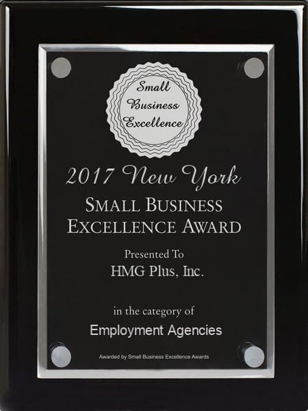 A black and silver award plaque presented to HMG Plus, Inc. for the 2017 New York Small Business Excellence Award in the category of Employment Agencies, awarded by Small Business Excellence Awards.